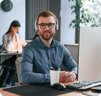 woman-is-behind-the-man-two-employees-are-working-2023-11-27-04-49-08-utc 1